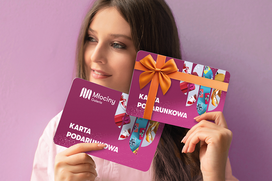 grafika do wydarzenia kobieta trzyma dwie karty podarunkowe galerii młociny
