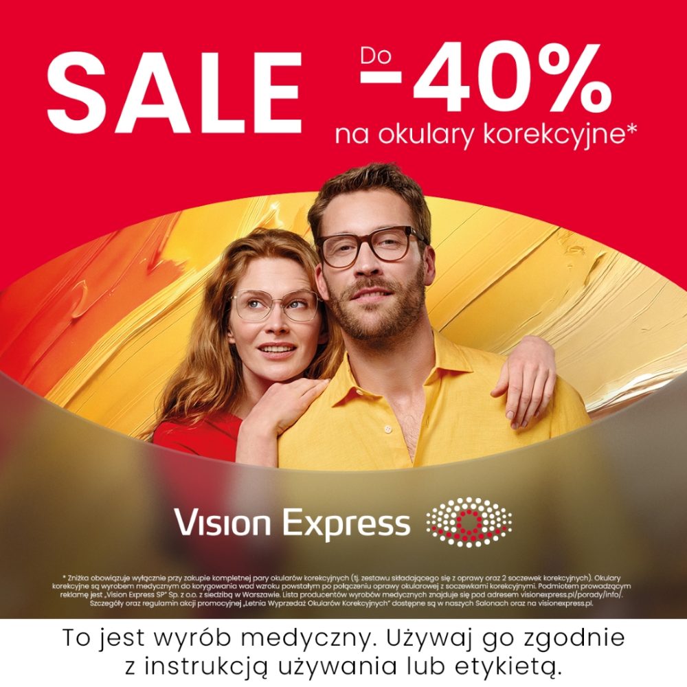 Grafika reklamowa ukazuje uśmiechniętą parę pozującą w stylowych oprawkach okularowych z logo Vision Express poniżej. Na dole plakatu umieszczono oficjalne ostrzeżenie medyczne dotyczące prawidłowego użytkowania wyrobów medycznych.